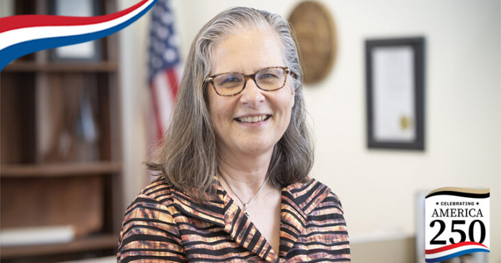 Shelley MacDermid Wadsworth with celebrating america 250 logo and red, white, blue ribbon graphic in corners